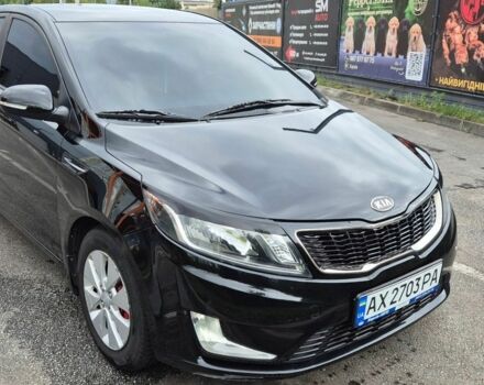 Черный Киа Рио, объемом двигателя 1.59 л и пробегом 127 тыс. км за 8800 $, фото 1 на Automoto.ua
