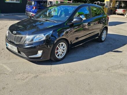 Черный Киа Рио, объемом двигателя 1.4 л и пробегом 174 тыс. км за 4000 $, фото 1 на Automoto.ua