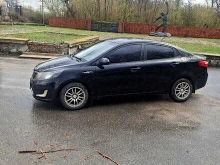 Черный Киа Рио, объемом двигателя 1.4 л и пробегом 197 тыс. км за 7000 $, фото 1 на Automoto.ua