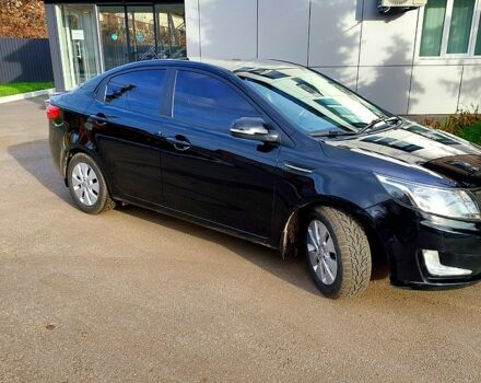 Черный Киа Рио, объемом двигателя 1.6 л и пробегом 246 тыс. км за 6600 $, фото 1 на Automoto.ua