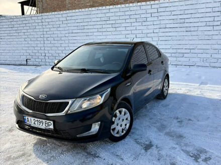 Черный Киа Рио, объемом двигателя 1.6 л и пробегом 270 тыс. км за 6650 $, фото 1 на Automoto.ua
