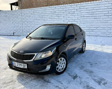 Черный Киа Рио, объемом двигателя 1.6 л и пробегом 270 тыс. км за 6650 $, фото 1 на Automoto.ua