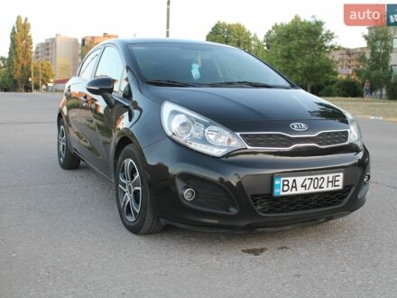Чорний Кіа Ріо, об'ємом двигуна 1.12 л та пробігом 235 тис. км за 6400 $, фото 1 на Automoto.ua