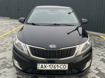 Чорний Кіа Ріо, об'ємом двигуна 1.4 л та пробігом 209 тис. км за 4850 $, фото 1 на Automoto.ua