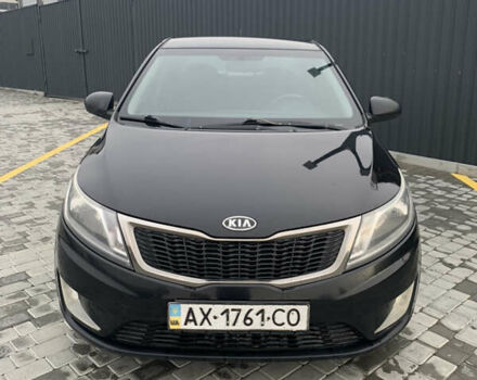 Чорний Кіа Ріо, об'ємом двигуна 1.4 л та пробігом 209 тис. км за 4850 $, фото 1 на Automoto.ua