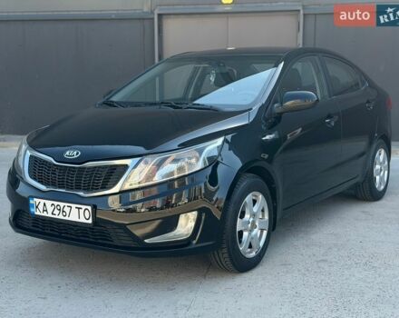 Чорний Кіа Ріо, об'ємом двигуна 1.4 л та пробігом 201 тис. км за 6950 $, фото 1 на Automoto.ua