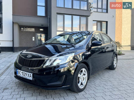 Черный Киа Рио, объемом двигателя 1.4 л и пробегом 199 тыс. км за 6300 $, фото 1 на Automoto.ua