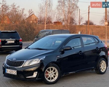 Чорний Кіа Ріо, об'ємом двигуна 1.4 л та пробігом 169 тис. км за 4499 $, фото 1 на Automoto.ua