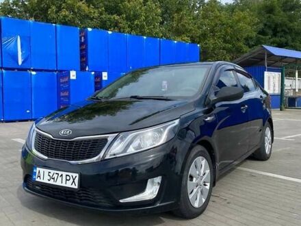 Черный Киа Рио, объемом двигателя 1.4 л и пробегом 92 тыс. км за 6999 $, фото 1 на Automoto.ua