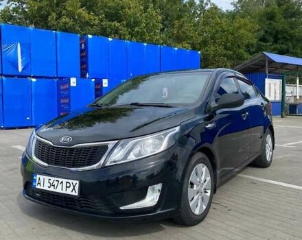 Чорний Кіа Ріо, об'ємом двигуна 1.4 л та пробігом 92 тис. км за 6999 $, фото 1 на Automoto.ua