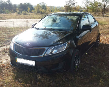 Чорний Кіа Ріо, об'ємом двигуна 1.4 л та пробігом 77 тис. км за 9200 $, фото 1 на Automoto.ua