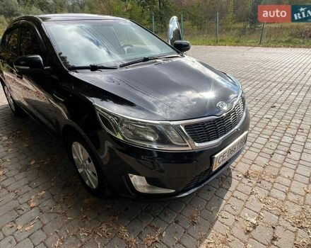 Черный Киа Рио, объемом двигателя 1.59 л и пробегом 160 тыс. км за 8200 $, фото 1 на Automoto.ua