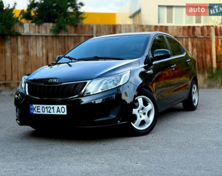 Черный Киа Рио, объемом двигателя 1.4 л и пробегом 124 тыс. км за 8400 $, фото 1 на Automoto.ua
