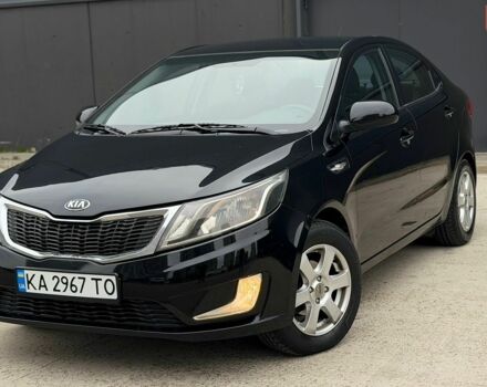 Чорний Кіа Ріо, об'ємом двигуна 1.4 л та пробігом 202 тис. км за 6900 $, фото 1 на Automoto.ua