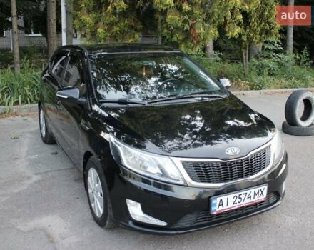 Черный Киа Рио, объемом двигателя 1.6 л и пробегом 217 тыс. км за 6200 $, фото 1 на Automoto.ua
