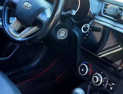 Чорний Кіа Ріо, об'ємом двигуна 1.4 л та пробігом 120 тис. км за 7700 $, фото 1 на Automoto.ua