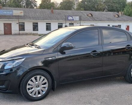 Чорний Кіа Ріо, об'ємом двигуна 1.4 л та пробігом 89 тис. км за 6800 $, фото 1 на Automoto.ua