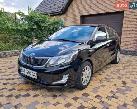 Чорний Кіа Ріо, об'ємом двигуна 1.4 л та пробігом 172 тис. км за 5700 $, фото 1 на Automoto.ua