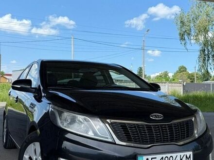 Черный Киа Рио, объемом двигателя 1.59 л и пробегом 204 тыс. км за 7000 $, фото 1 на Automoto.ua