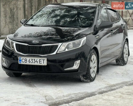 Черный Киа Рио, объемом двигателя 1.4 л и пробегом 155 тыс. км за 7500 $, фото 1 на Automoto.ua