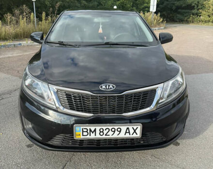 Черный Киа Рио, объемом двигателя 1.4 л и пробегом 74 тыс. км за 8900 $, фото 1 на Automoto.ua