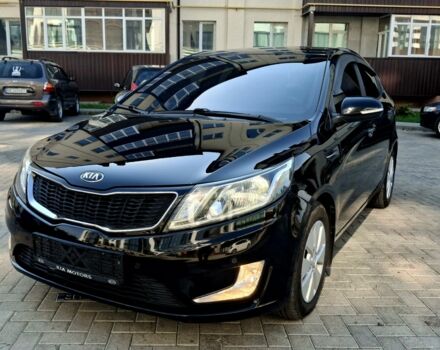 Черный Киа Рио, объемом двигателя 1.6 л и пробегом 130 тыс. км за 8750 $, фото 1 на Automoto.ua