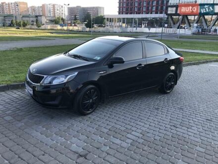 Чорний Кіа Ріо, об'ємом двигуна 1.4 л та пробігом 92 тис. км за 10000 $, фото 1 на Automoto.ua