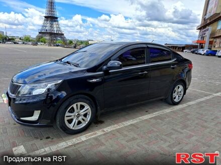 Черный Киа Рио, объемом двигателя 14 л и пробегом 96 тыс. км за 8600 $, фото 1 на Automoto.ua
