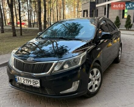 Черный Киа Рио, объемом двигателя 1.6 л и пробегом 272 тыс. км за 5950 $, фото 1 на Automoto.ua