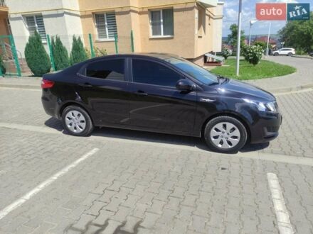 Черный Киа Рио, объемом двигателя 1.4 л и пробегом 186 тыс. км за 6800 $, фото 1 на Automoto.ua