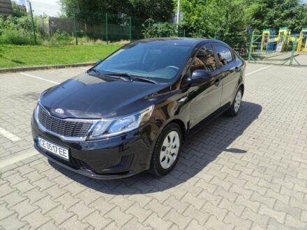 Черный Киа Рио, объемом двигателя 1.4 л и пробегом 186 тыс. км за 6800 $, фото 1 на Automoto.ua