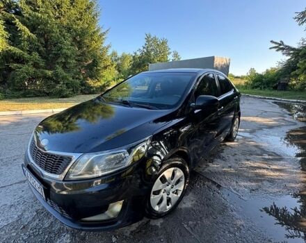 Чорний Кіа Ріо, об'ємом двигуна 1.4 л та пробігом 179 тис. км за 8000 $, фото 1 на Automoto.ua