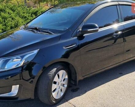 Чорний Кіа Ріо, об'ємом двигуна 1.6 л та пробігом 114 тис. км за 8800 $, фото 1 на Automoto.ua