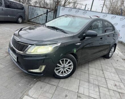 Черный Киа Рио, объемом двигателя 1.4 л и пробегом 214 тыс. км за 7700 $, фото 1 на Automoto.ua