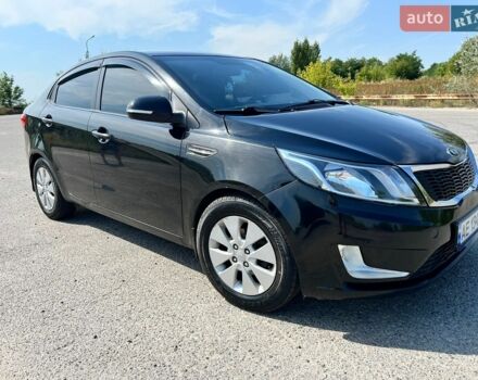 Черный Киа Рио, объемом двигателя 1.6 л и пробегом 142 тыс. км за 6800 $, фото 1 на Automoto.ua