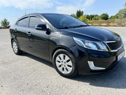 Черный Киа Рио, объемом двигателя 1.6 л и пробегом 142 тыс. км за 6798 $, фото 1 на Automoto.ua