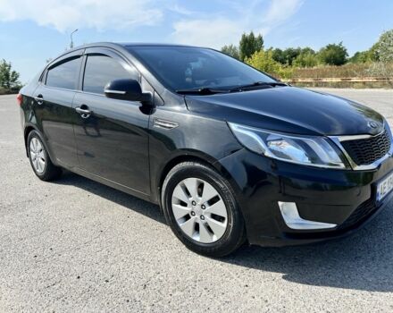 Черный Киа Рио, объемом двигателя 1.6 л и пробегом 142 тыс. км за 6798 $, фото 1 на Automoto.ua