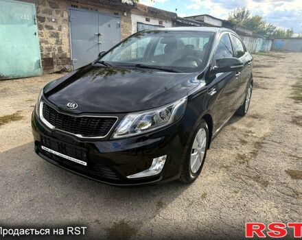 Черный Киа Рио, объемом двигателя 1.6 л и пробегом 61 тыс. км за 10000 $, фото 1 на Automoto.ua