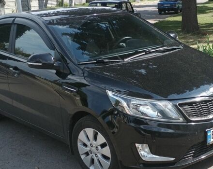 Чорний Кіа Ріо, об'ємом двигуна 1.6 л та пробігом 139 тис. км за 9000 $, фото 1 на Automoto.ua