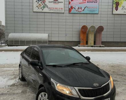 Чорний Кіа Ріо, об'ємом двигуна 1.6 л та пробігом 270 тис. км за 5850 $, фото 1 на Automoto.ua