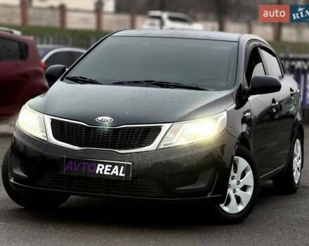 Черный Киа Рио, объемом двигателя 1.4 л и пробегом 220 тыс. км за 8200 $, фото 1 на Automoto.ua