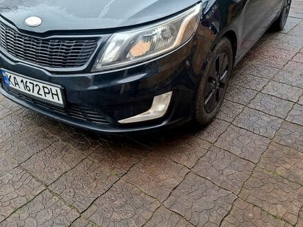 Черный Киа Рио, объемом двигателя 1.6 л и пробегом 320 тыс. км за 6500 $, фото 1 на Automoto.ua