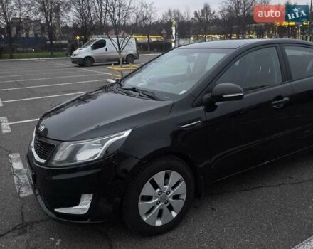 Черный Киа Рио, объемом двигателя 1.59 л и пробегом 150 тыс. км за 9000 $, фото 1 на Automoto.ua