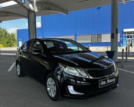 Черный Киа Рио, объемом двигателя 0 л и пробегом 97 тыс. км за 4994 $, фото 1 на Automoto.ua