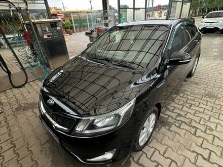 Чорний Кіа Ріо, об'ємом двигуна 1.6 л та пробігом 140 тис. км за 8500 $, фото 1 на Automoto.ua