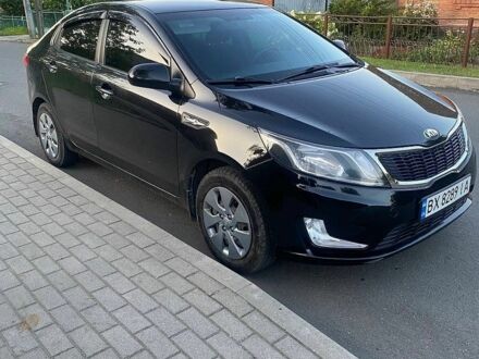 Чорний Кіа Ріо, об'ємом двигуна 1.4 л та пробігом 173 тис. км за 6500 $, фото 1 на Automoto.ua