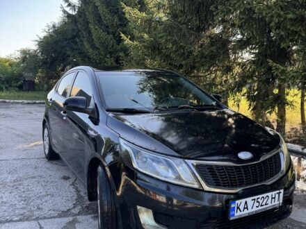 Чорний Кіа Ріо, об'ємом двигуна 1.4 л та пробігом 179 тис. км за 7998 $, фото 1 на Automoto.ua