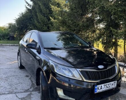 Чорний Кіа Ріо, об'ємом двигуна 1.4 л та пробігом 179 тис. км за 7998 $, фото 1 на Automoto.ua