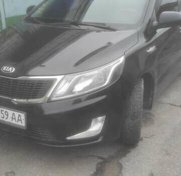 Черный Киа Рио, объемом двигателя 1.4 л и пробегом 120 тыс. км за 8500 $, фото 1 на Automoto.ua