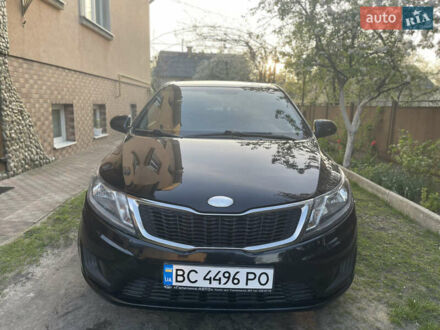 Чорний Кіа Ріо, об'ємом двигуна 1.4 л та пробігом 150 тис. км за 7800 $, фото 1 на Automoto.ua